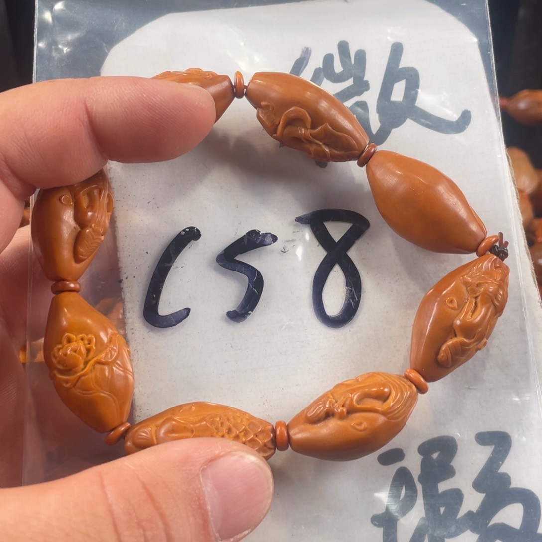 橄榄核其他橄榄核雕工艺手串 瑕疵介意勿拍