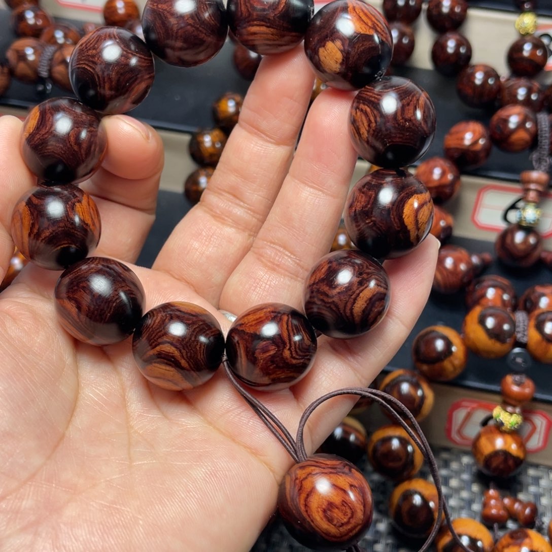 忕***佪花梨木类2.0鬼脸对眼