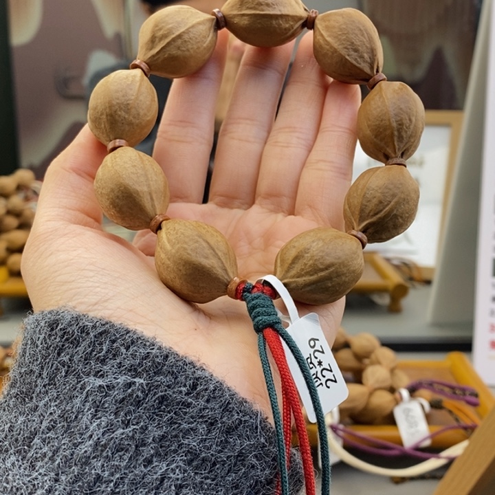 吊坠橄榄核?****人梅林铁