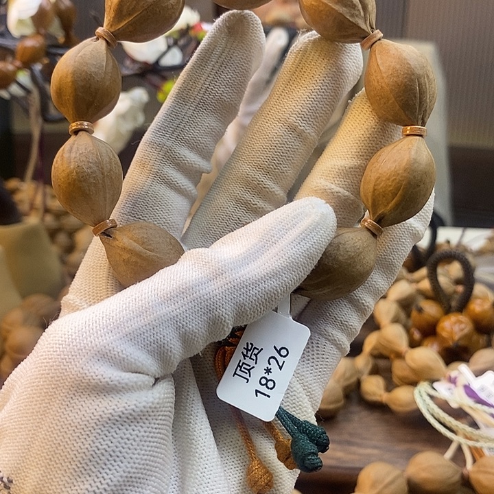 何***何橄榄核吊坠梅林铁核