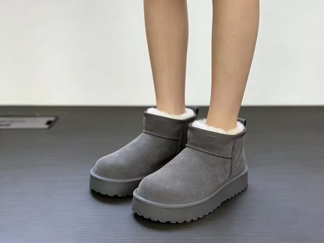 芒果头雪地靴牛皮内羊毛一体厚底冬季短筒保暖一脚蹬短靴