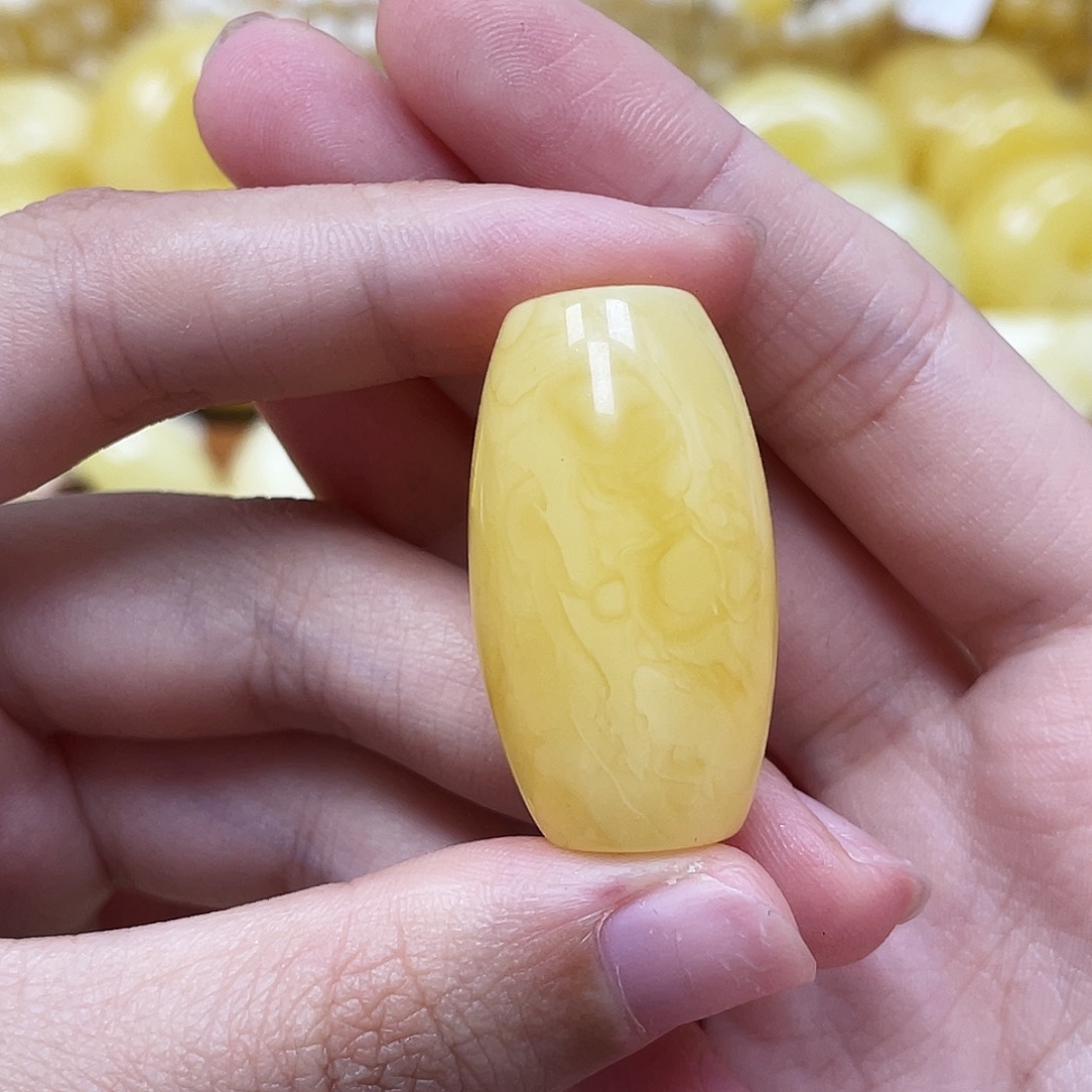 琥珀未镶嵌裸石18.2*33mm妖花长桶珠瑕