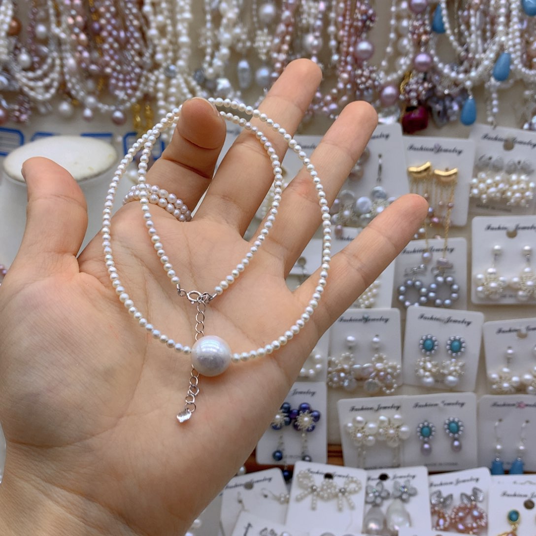 腼***人合金淡水珍珠项链耳饰