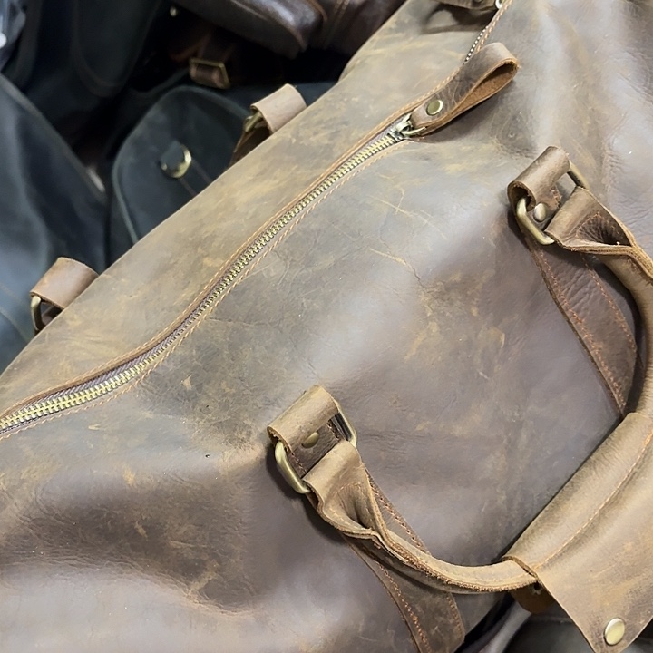 头层牛皮旅行包包