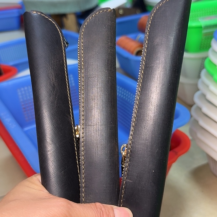 黑色微瑕头层牛皮小笔袋三个