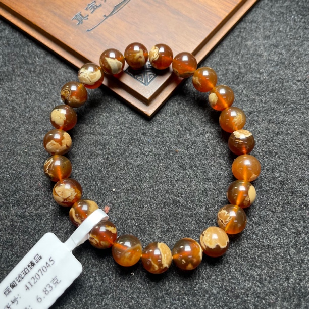 天然缅甸琥珀红蜜瓷白妖花溶洞手串