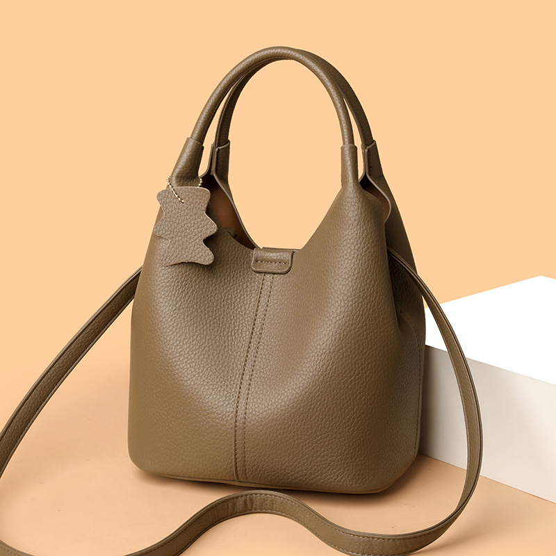 k【k专拍】女士时尚荔枝纹水桶包软皮洋气斜跨包