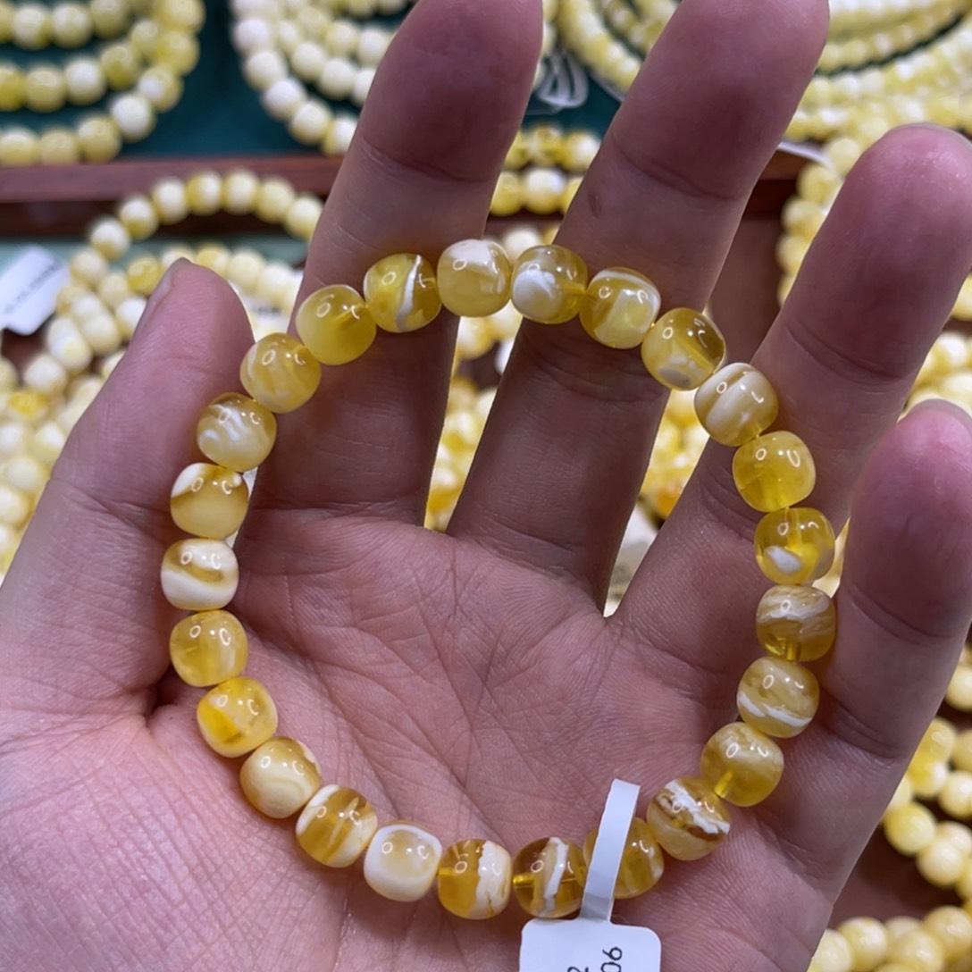 蜜蜡未镶嵌珠宝奇石8.5mm橘底金瓷白溶洞