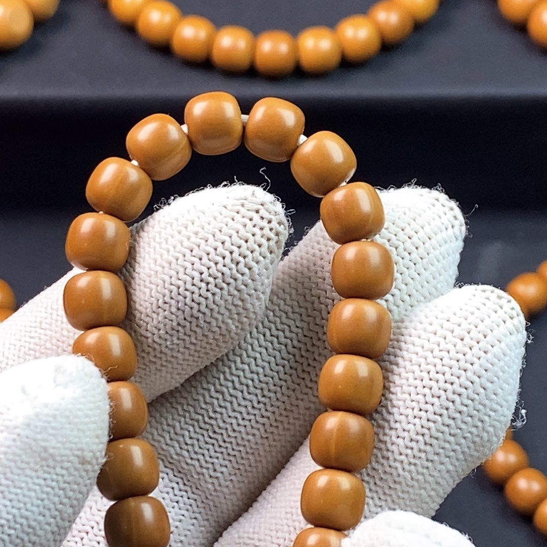 呜***王手串桃核全品老型