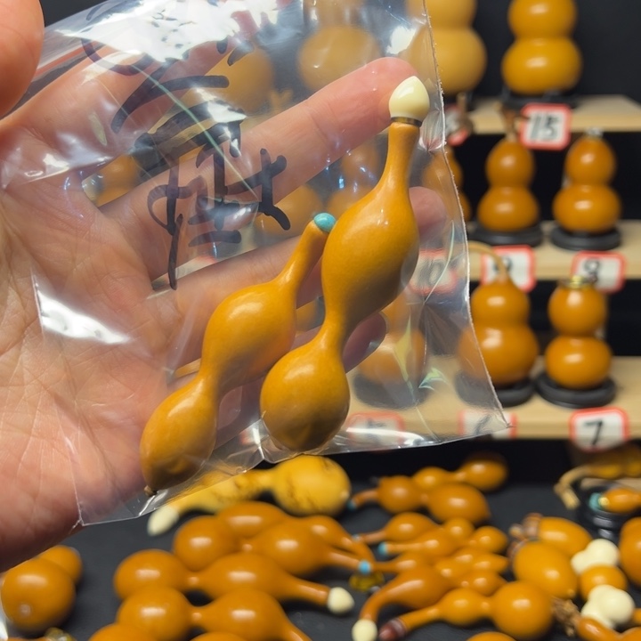 渤****理天然小葫芦手把件