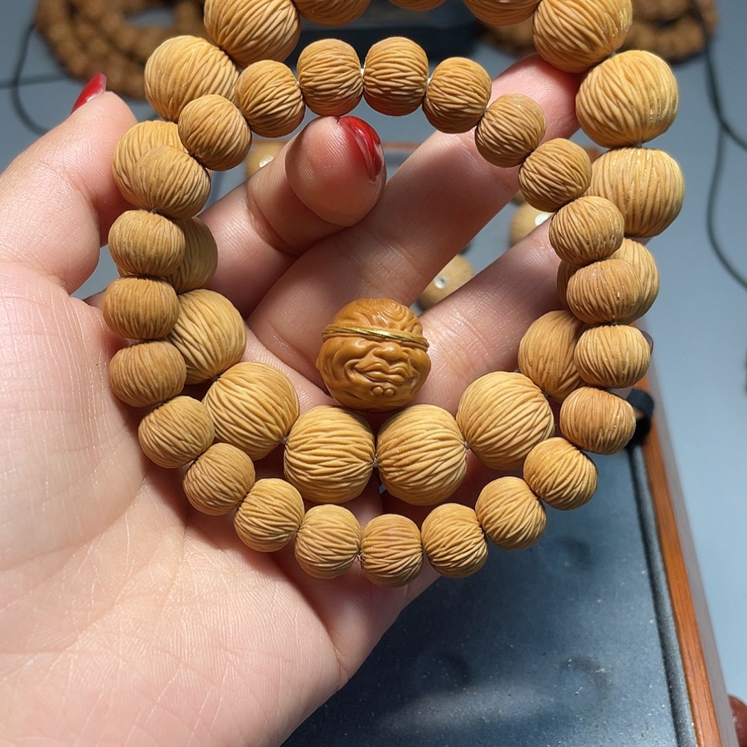 静***海手串猴头核桃金丝