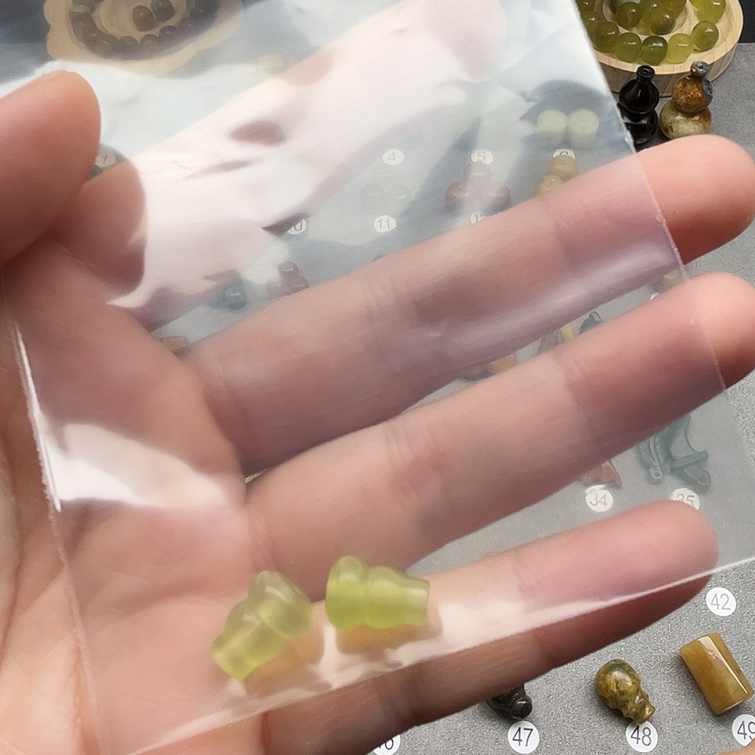 蜜****蛇纹石玉未镶嵌配珠