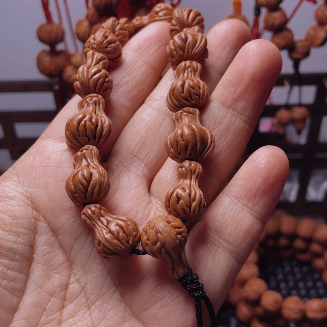 木质类龙纹桃枭手串