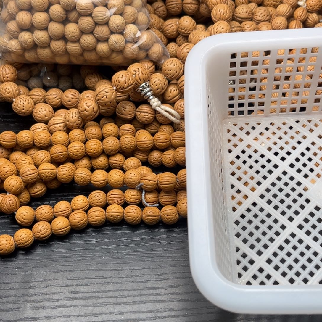 雷***生文玩核桃手串小桃哈散籽批发