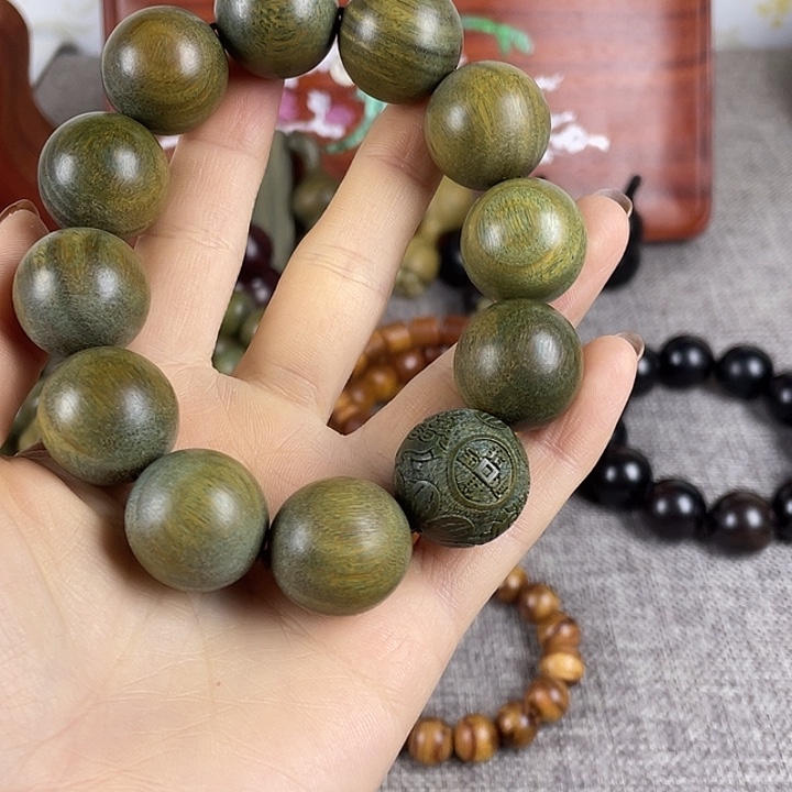 薇***姐香榧木绿檀2.0单圈