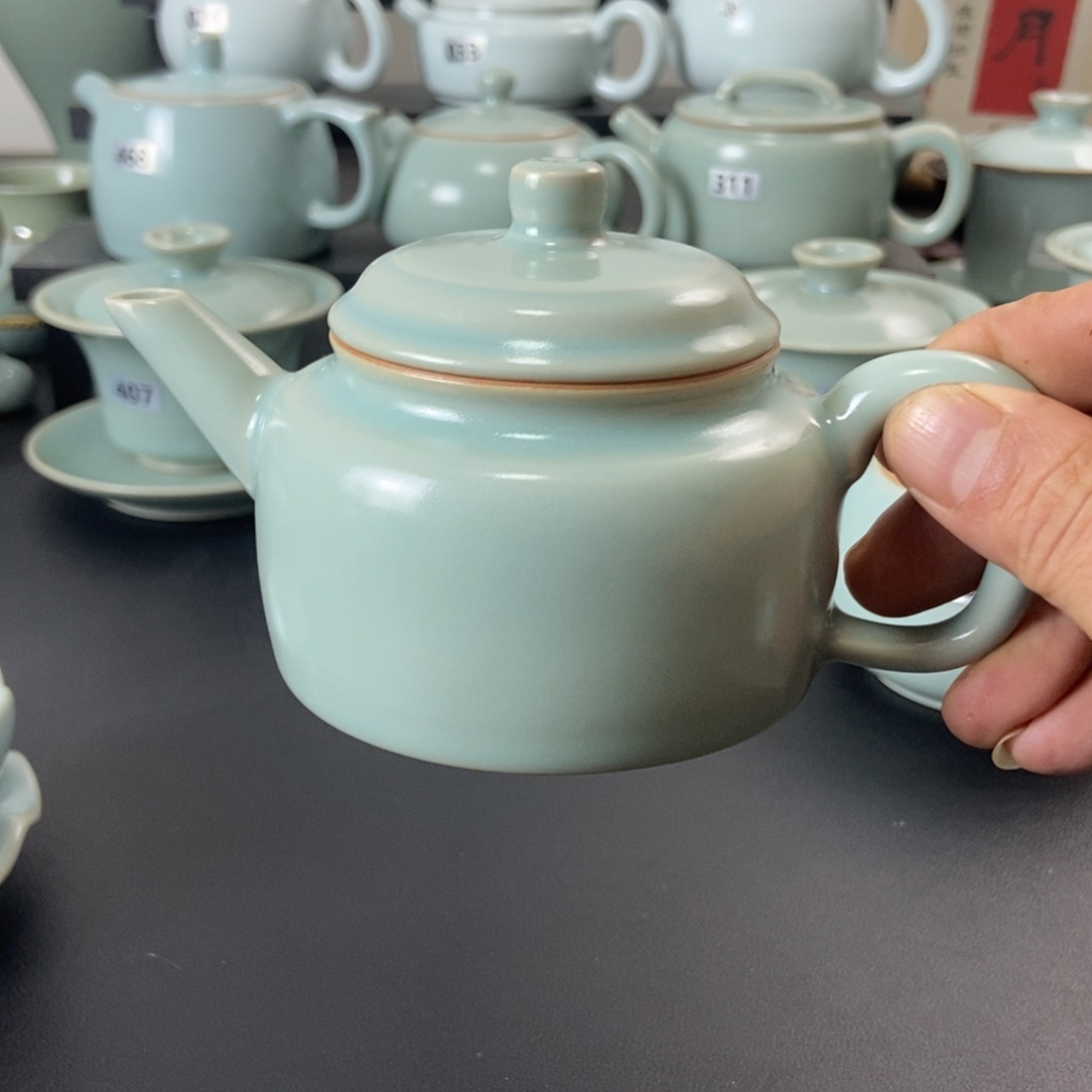 在***人一级品仿古釉手工德钟壶