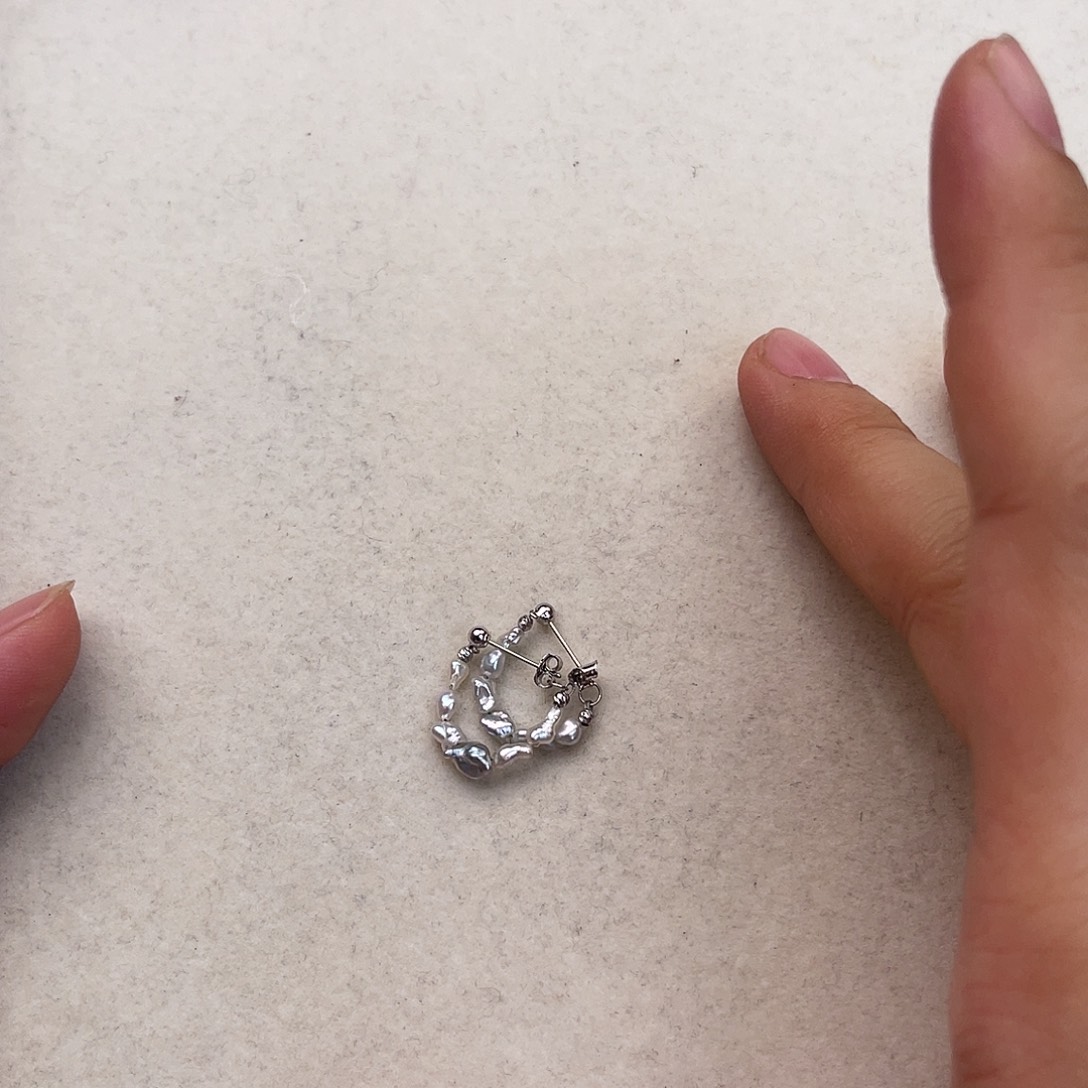 叶****海水珍珠18K金镶嵌耳饰