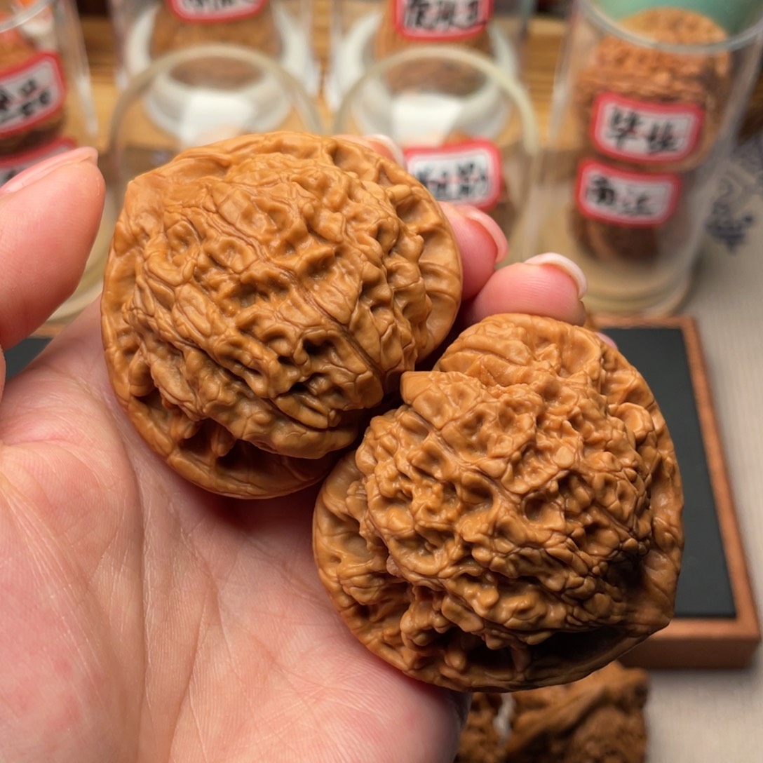 桃核把件全品满肉桃心麒麟51.8