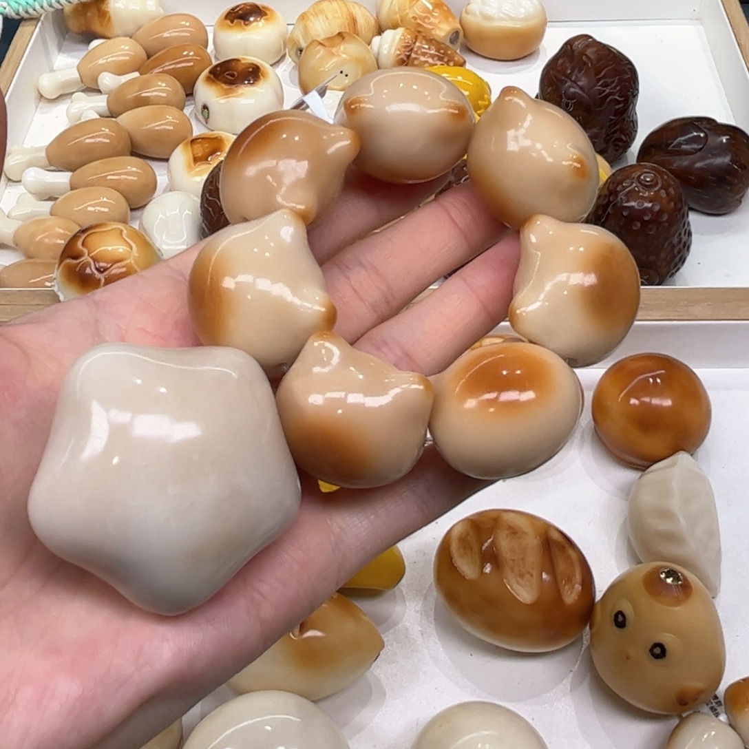t****手串菩提根/象牙果8.26.19象牙果把件加猫头瑕