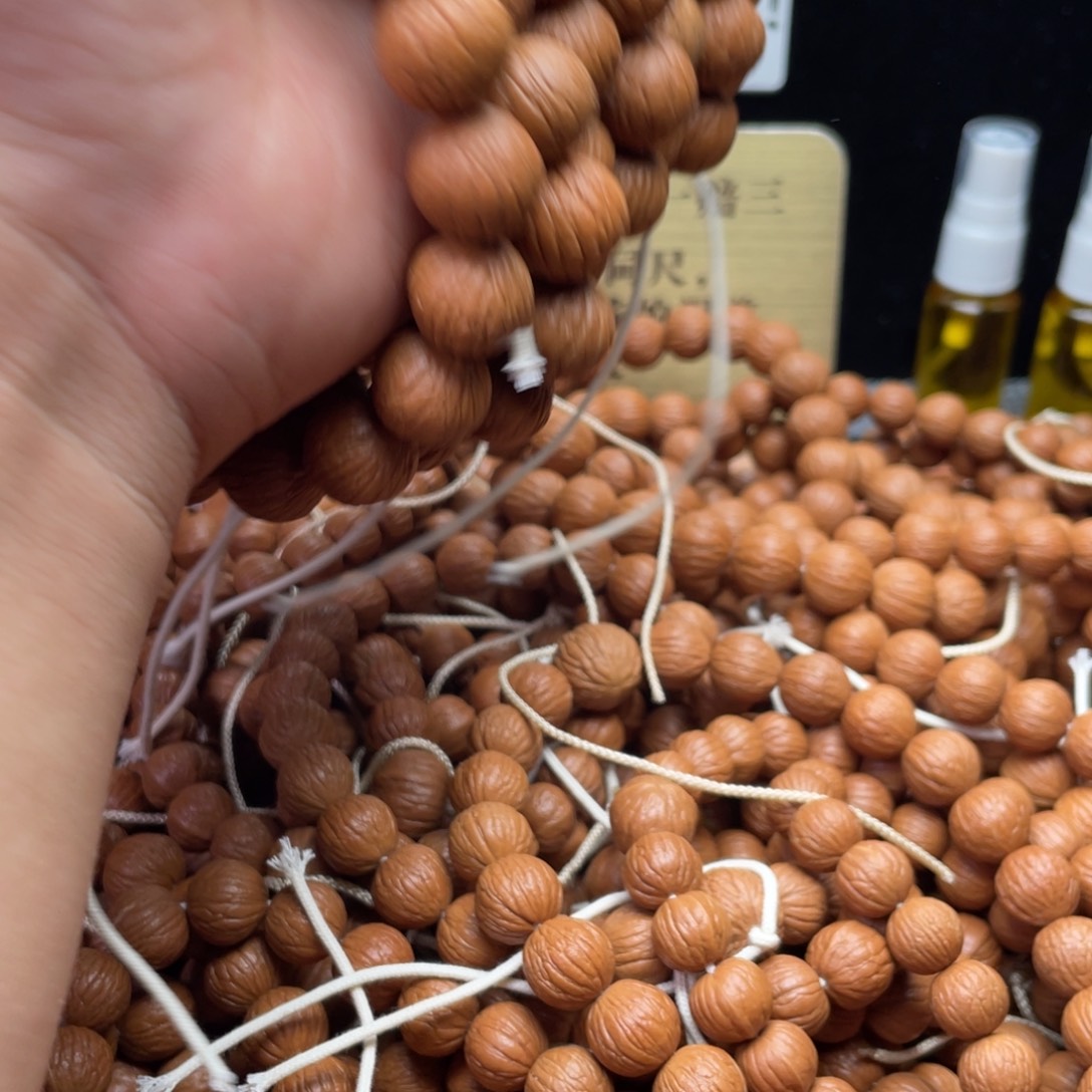 吊坠猴头核桃凤羽