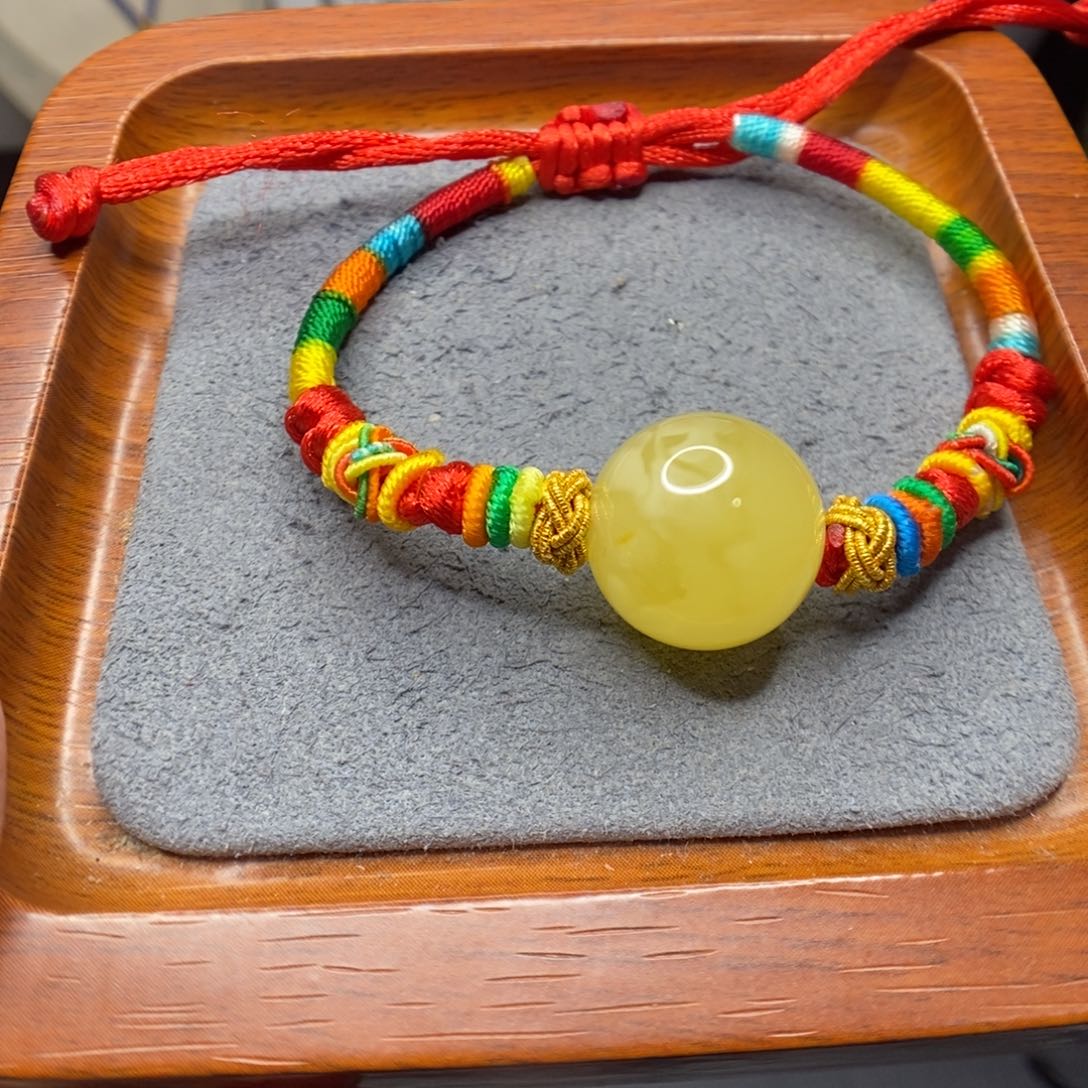 是***⁸蜜蜡未镶嵌颈饰郎