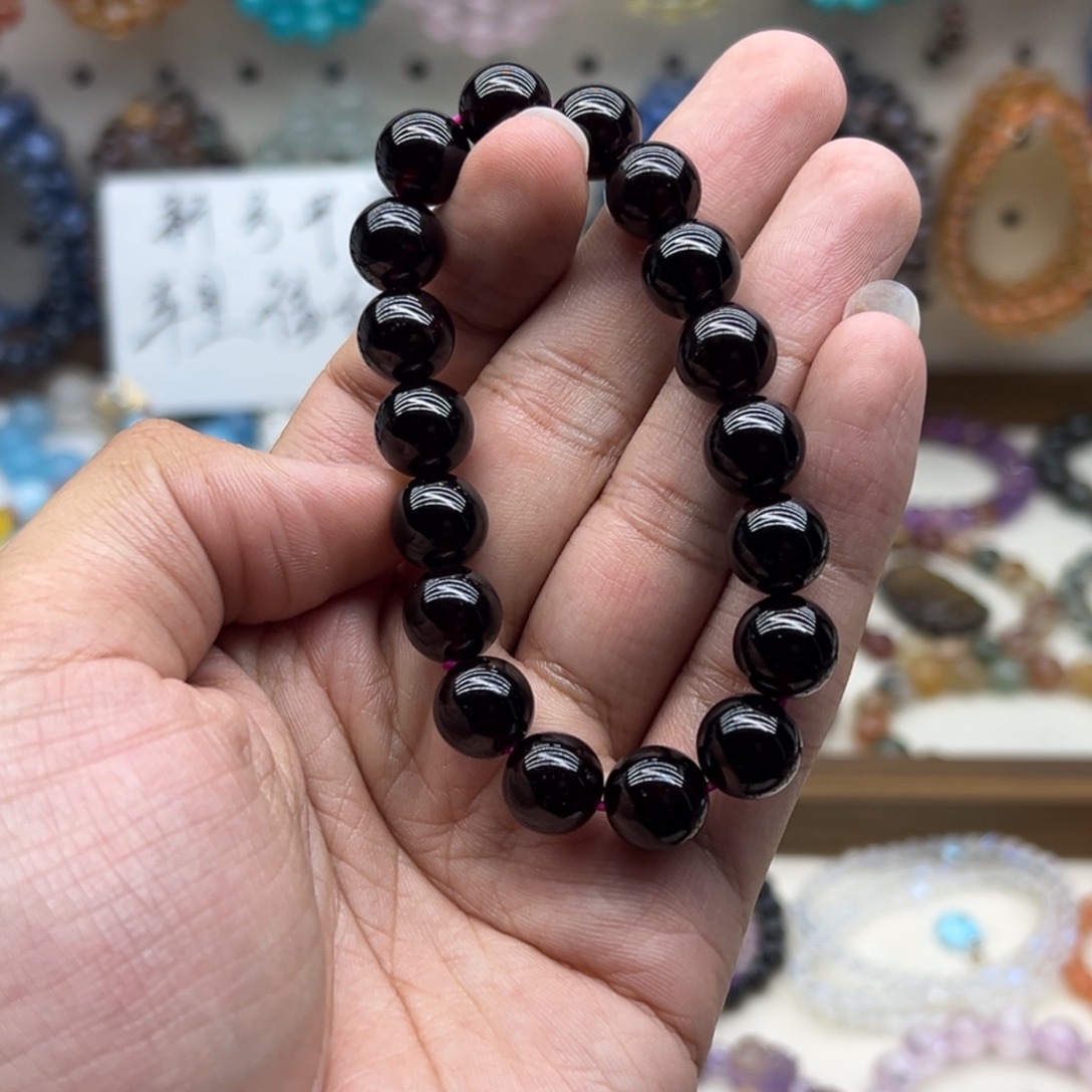 槿****手链水晶未镶嵌11.1咪酒红石榴石