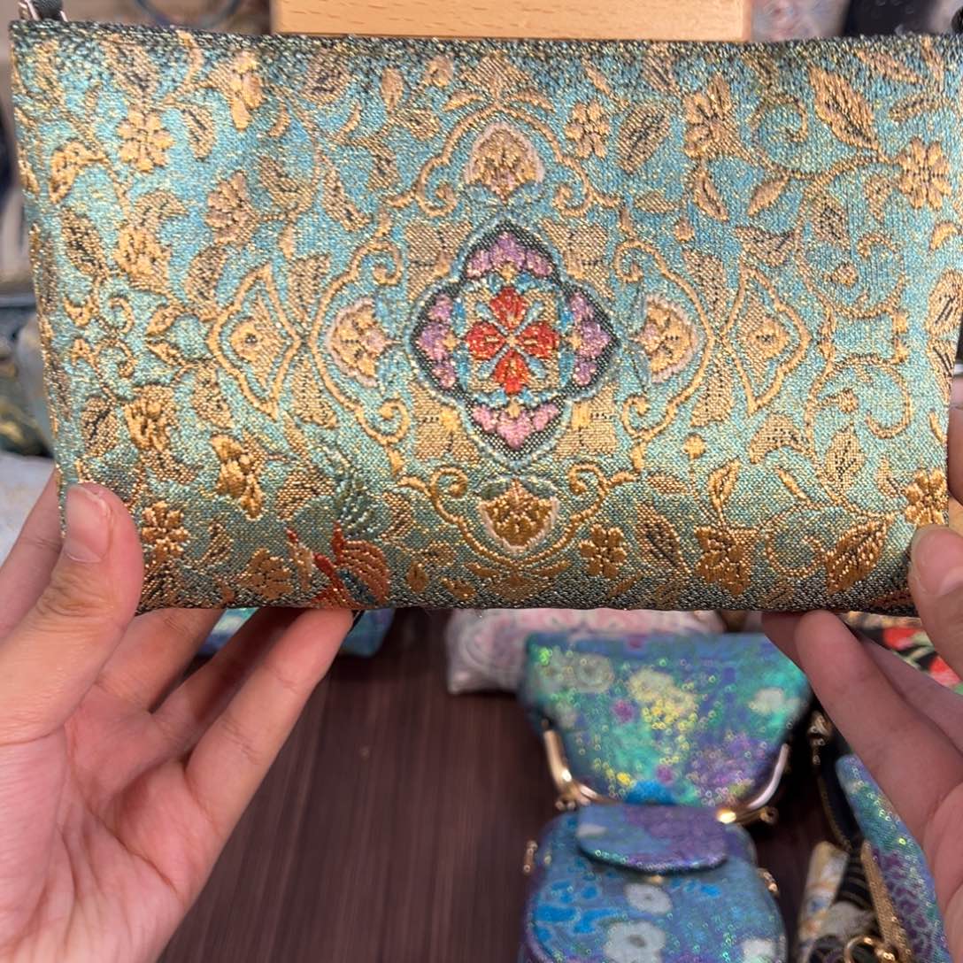 孞***琞塑料木夹片斜挎包