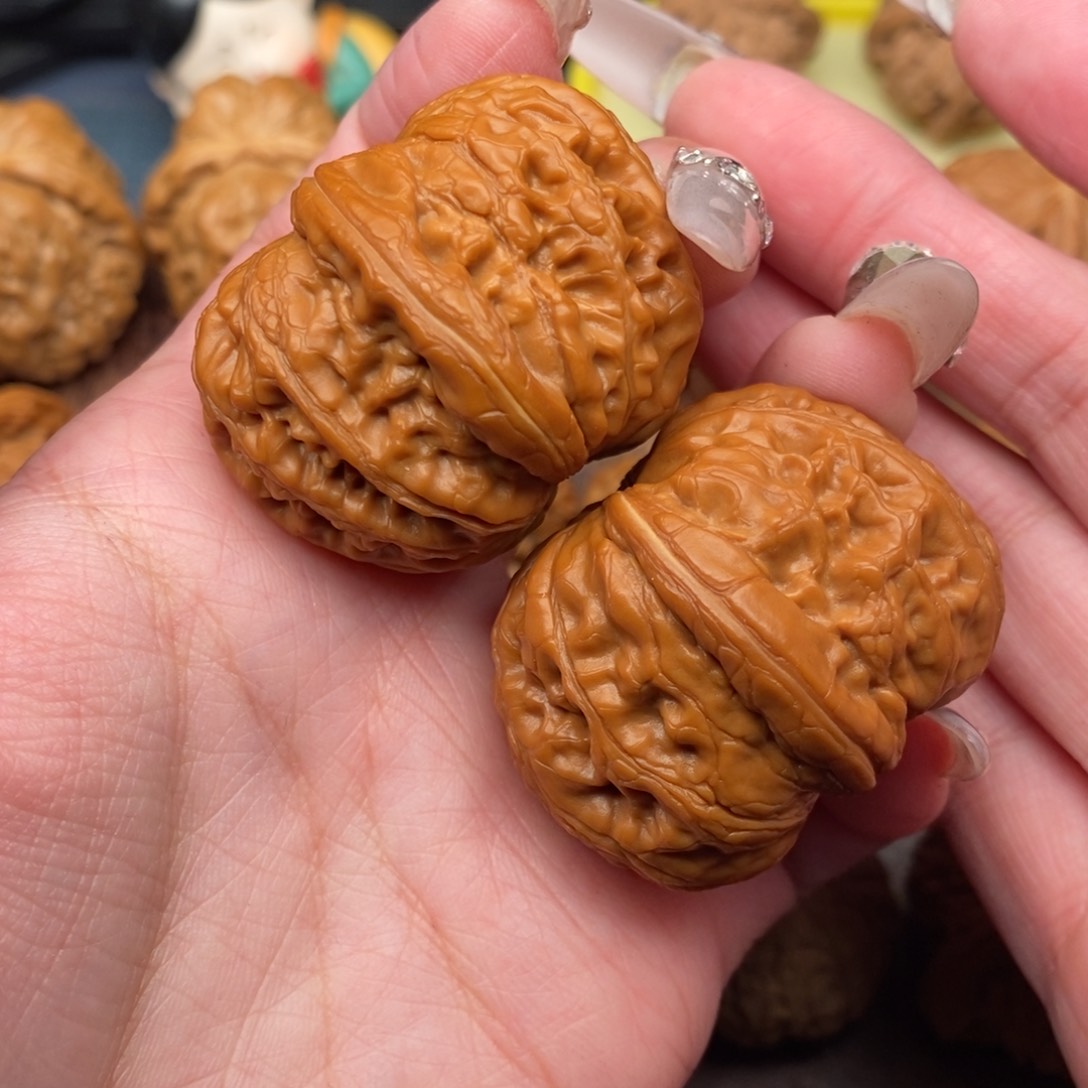 文玩核桃把件姚**口平谷元宝42