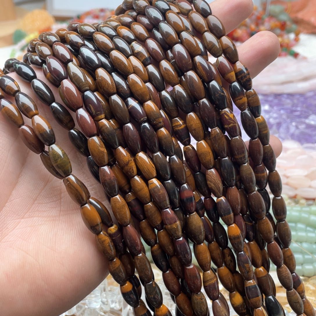 玛瑙/玉髓未镶嵌珠宝半成品一条装6*12mm虎眼共生米珠