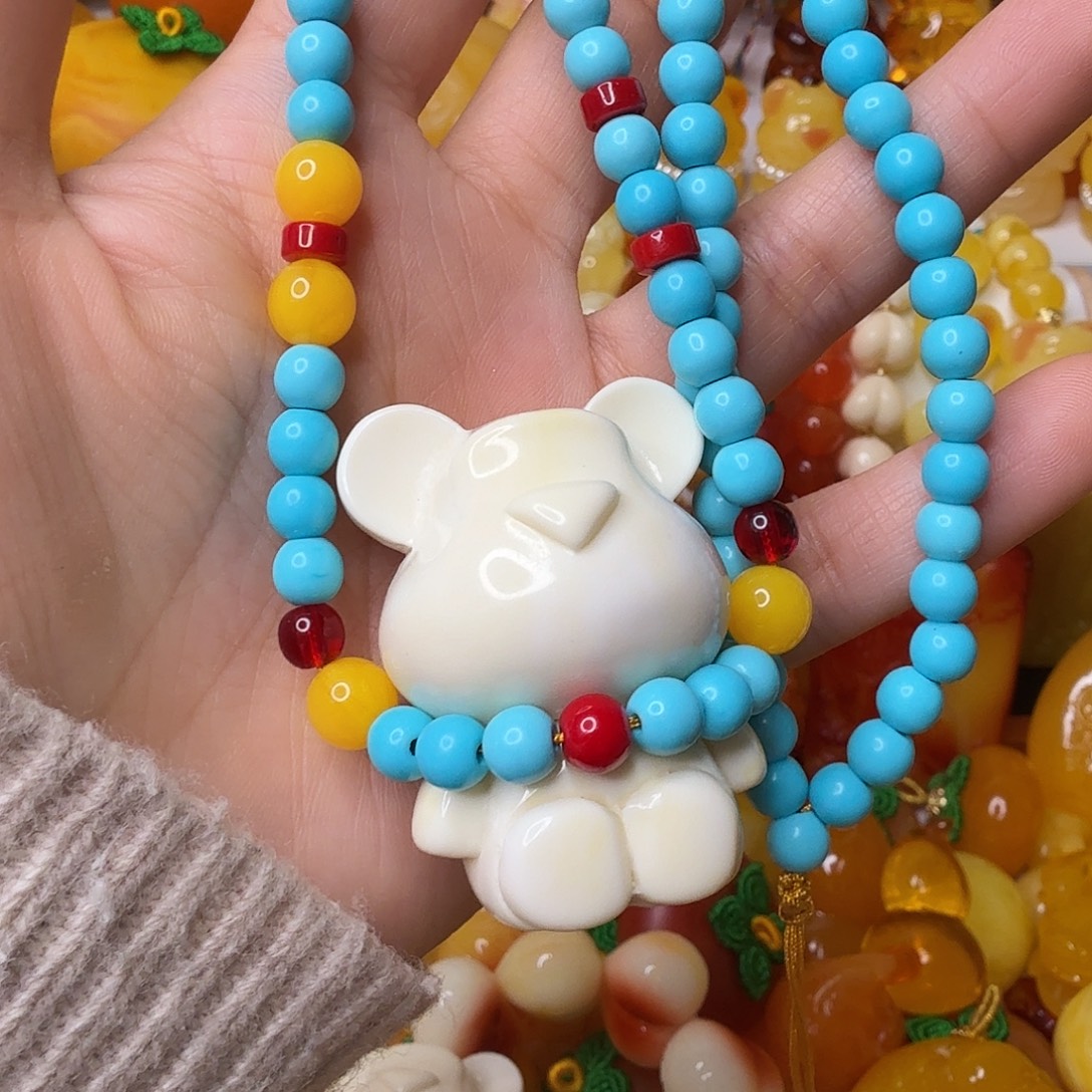 怡***毅非金属白熊毛衣链