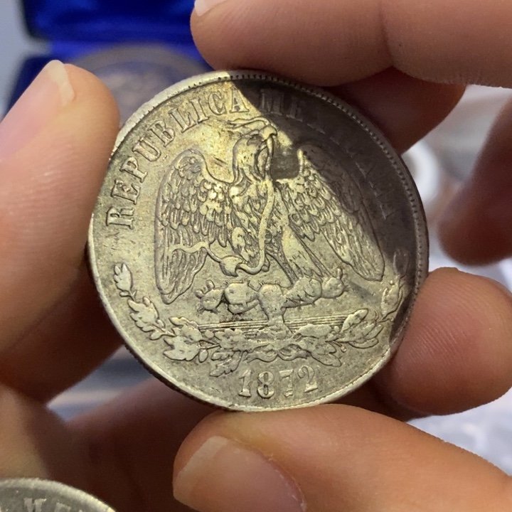 用***2银Ag900如图一个银币