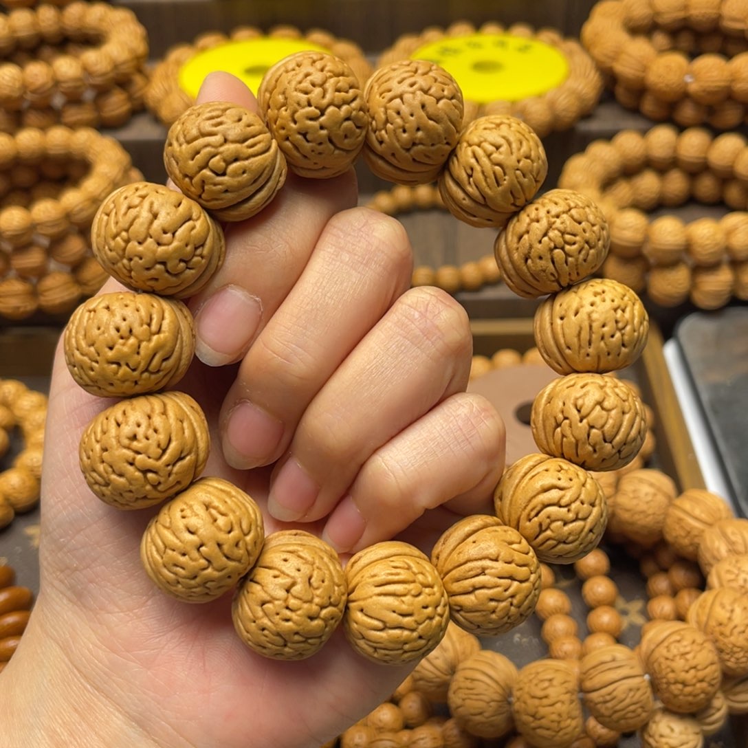 桃核手串小**?至尊国核