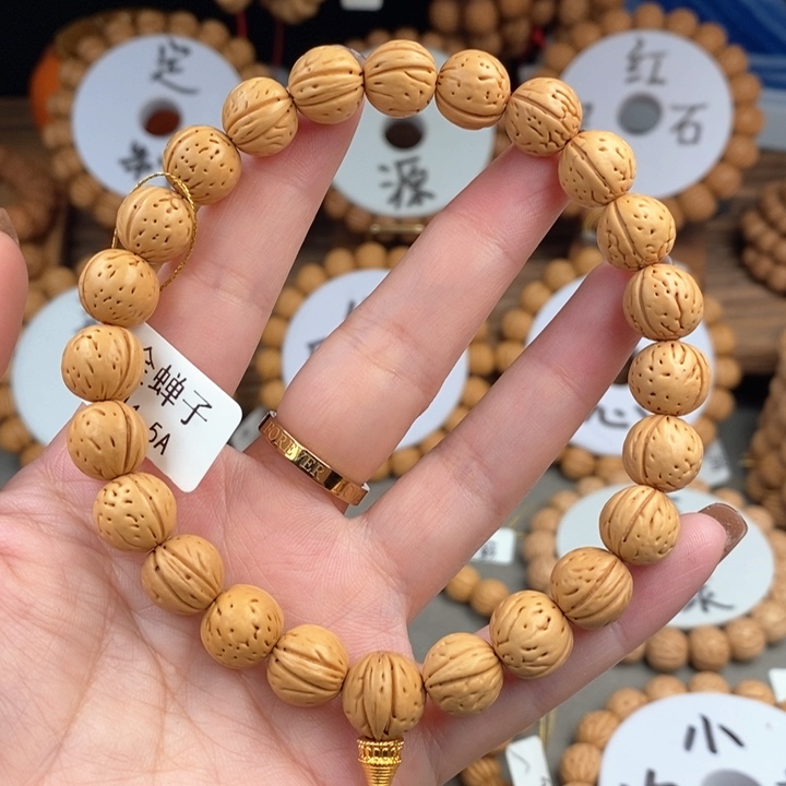 桃核手串金蝉子11.5a抛光板误差0.5