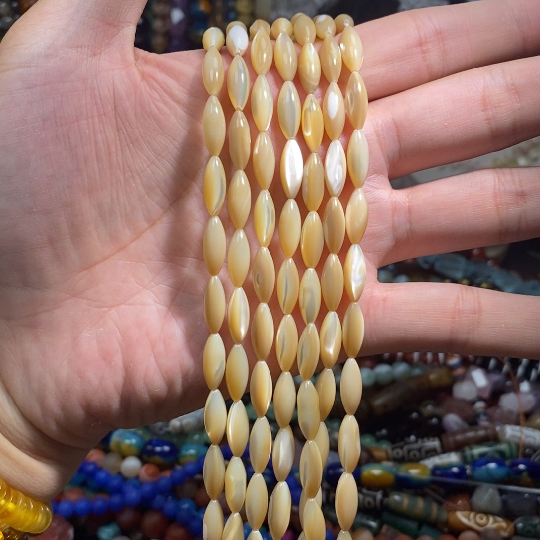 未镶嵌，马蹄螺米珠6×14mm，石英质玉