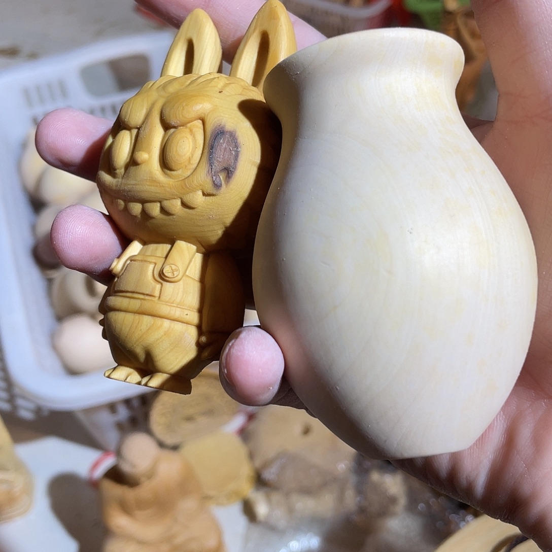 吴***哈黄杨木瑕疵拉布布➕花瓶