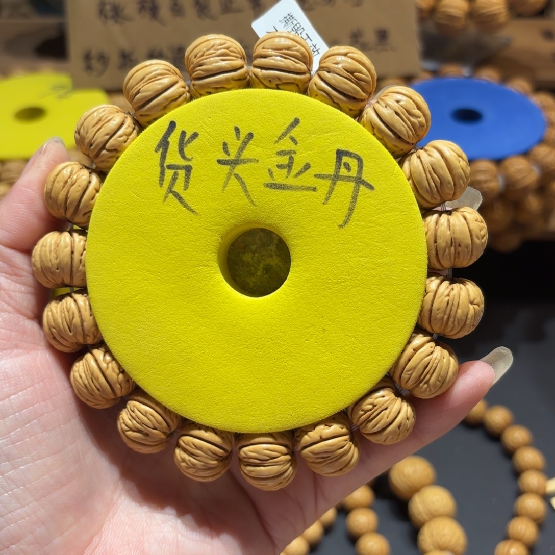 毅***桃核手串金丹12号