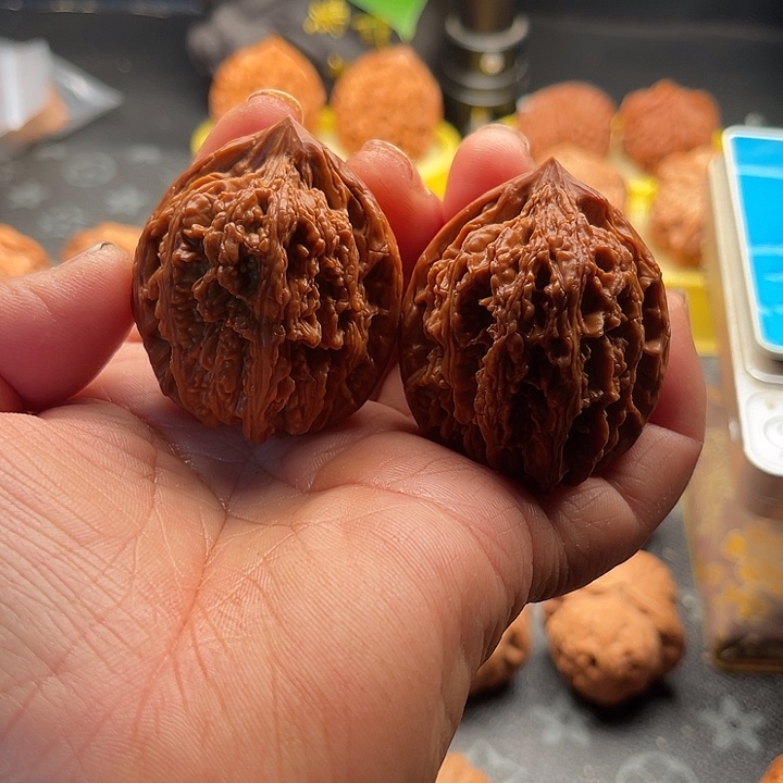 桃核把件九龙筋边40