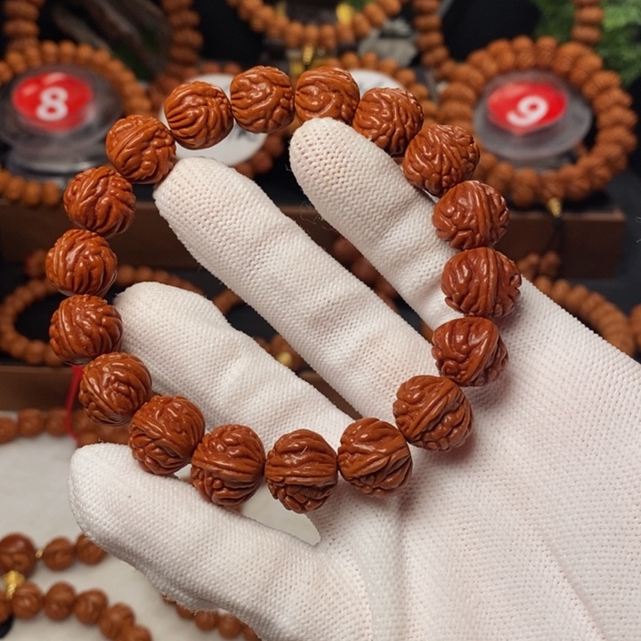 桃核手串吴****?秦岭龙纹