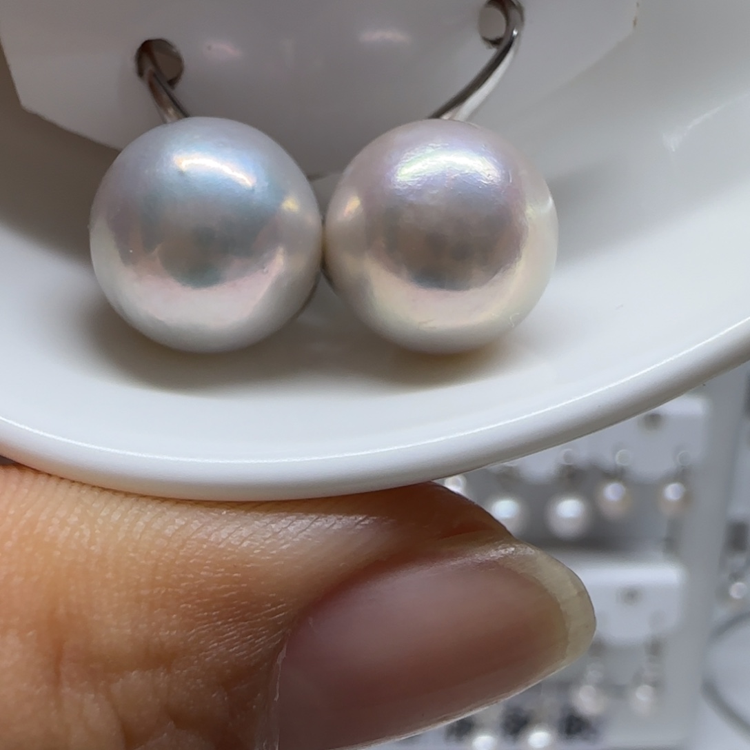 芷***君淡水珍珠银S925镶嵌耳饰