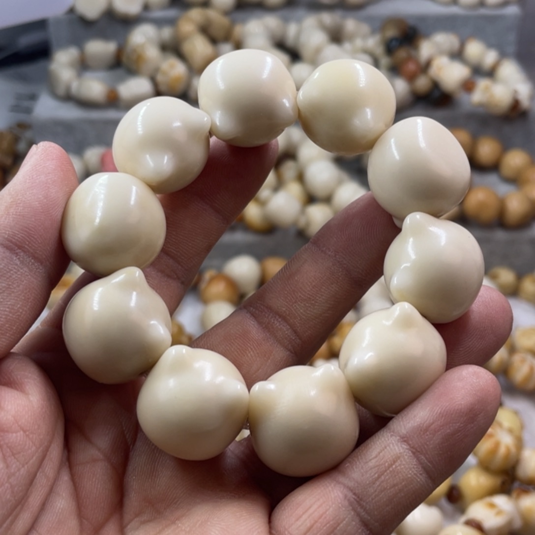 吊坠菩提根/象牙果全品象牙果猫头手串k21