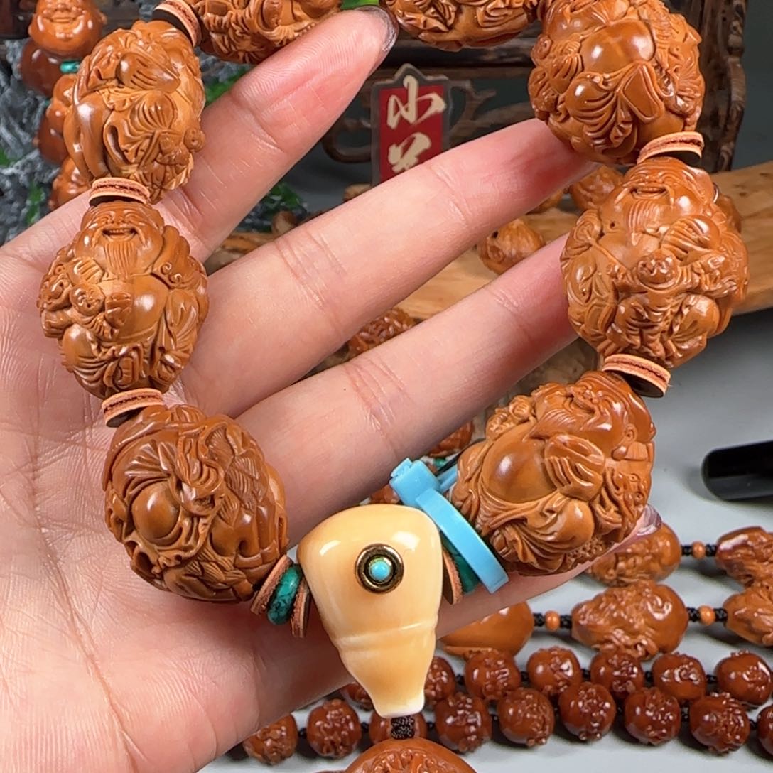 橄榄核手串/手链贺*多宽2.4鸡血红梅林核骑兽双童子财神