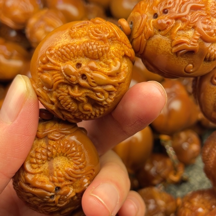 橄榄核吊坠小**哈橄榄核