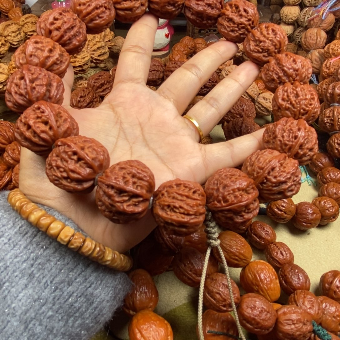 姓***王文玩核桃吊坠桃心手持文玩核桃