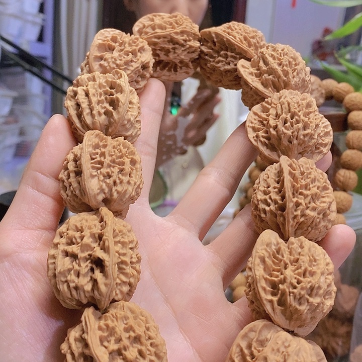 【闪购商品】文玩核桃把件37凤眼手持