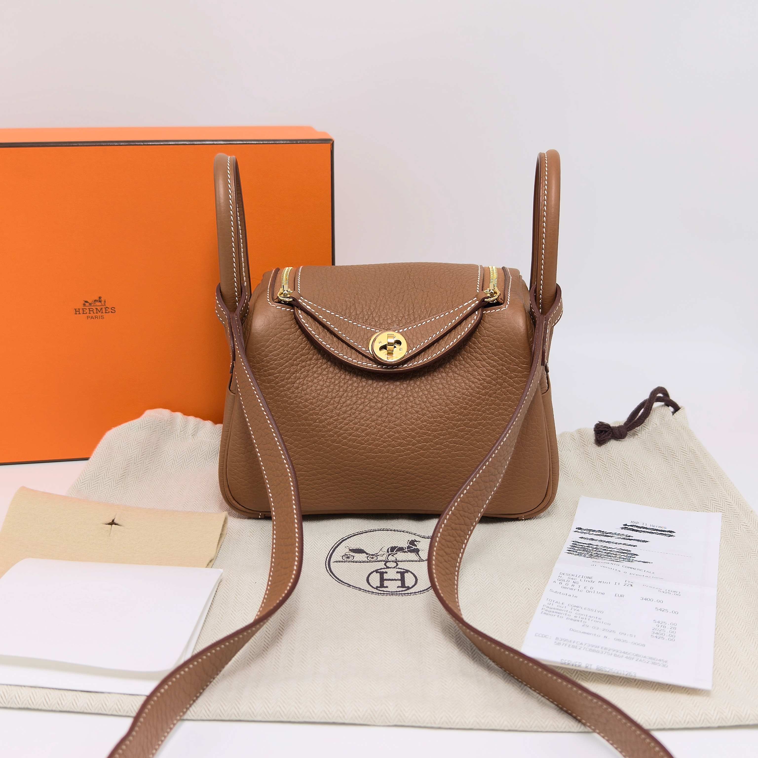 99新 Hermes/爱马仕 金棕金Lindy mini手提斜挎包 93580