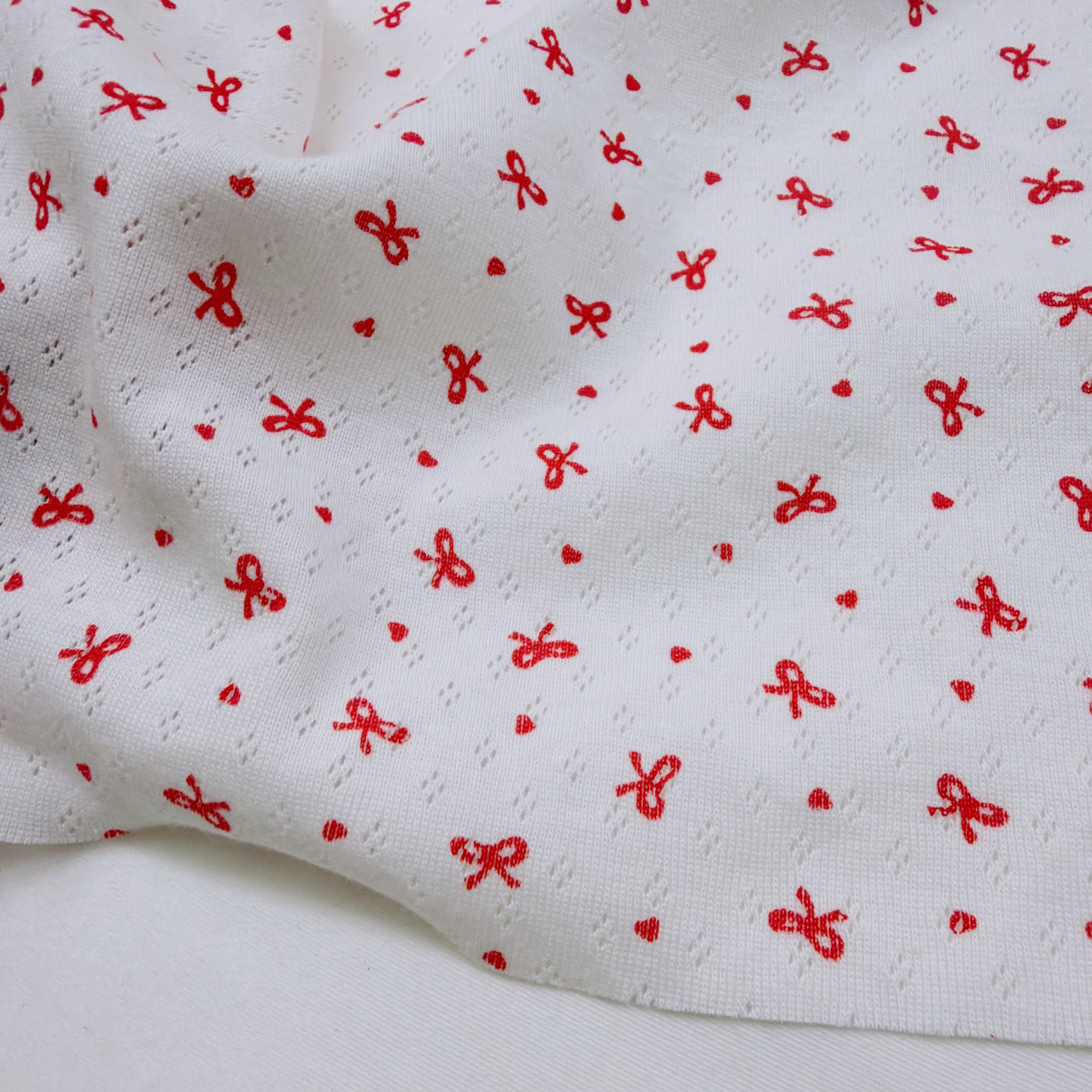 402纯棉提花爱心红色蝴蝶结弹力针织手工diy面料一米【宽1.9】