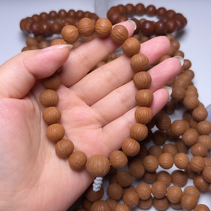 逗****猴头核桃吊坠12+同尺凤羽手持