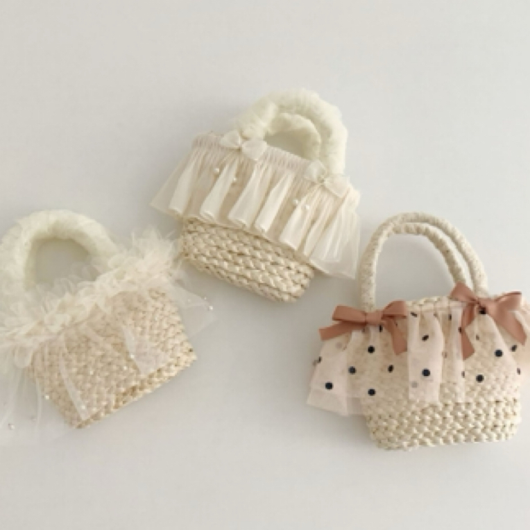 超仙网纱玉米皮手提包包女童夏季穿搭拍照凹造型天然草编敞口包