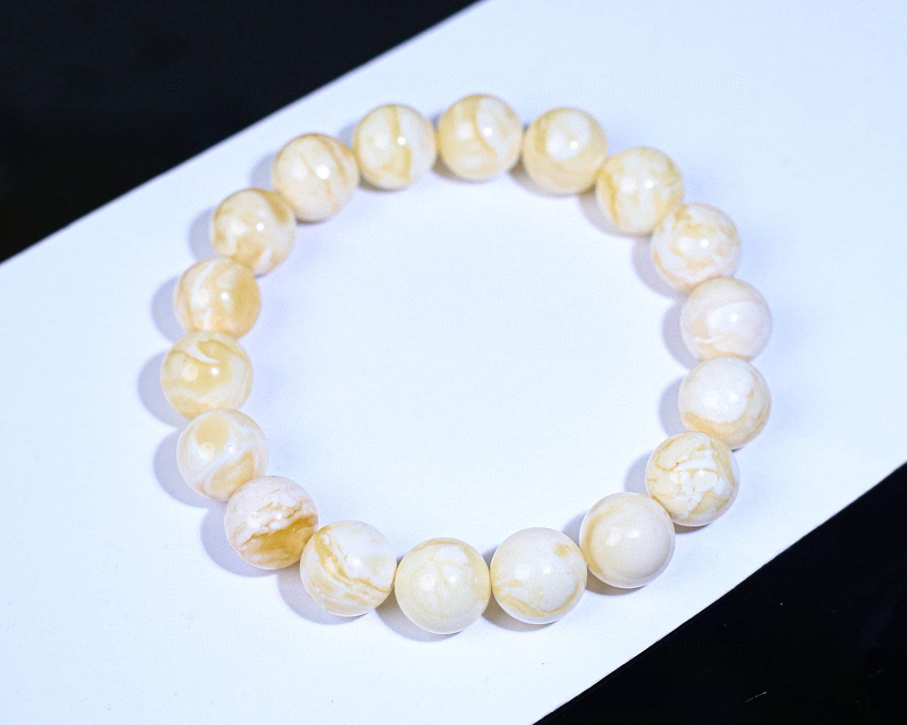 15.8克11+mmO俄料白花蜡圆珠手串，花纹好看，蜡质浓郁