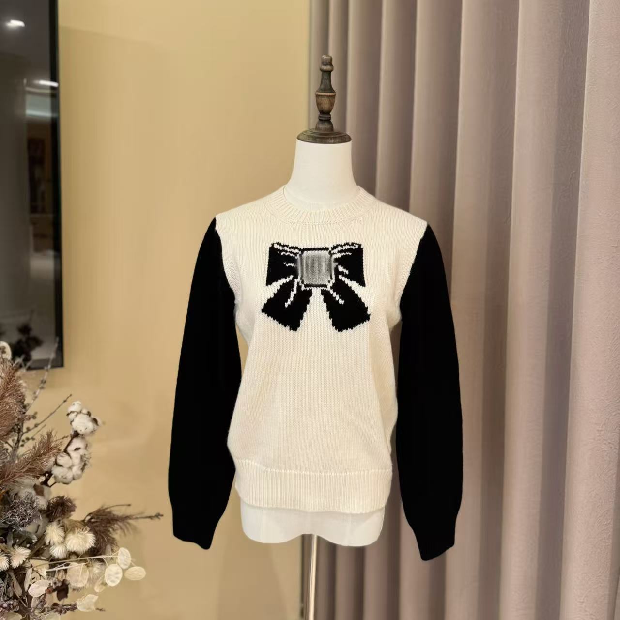 【晨老板】S【蝴蝶情书】时尚拼色蝴蝶结圆领长袖针织衫79257040